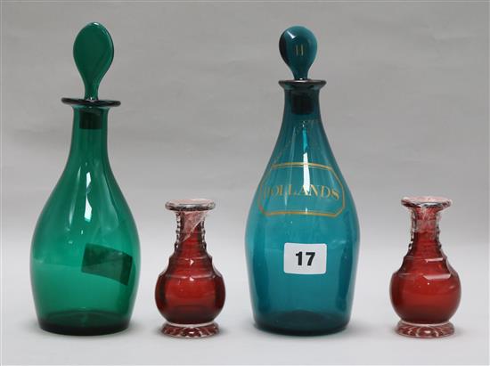 Two green glass decanters and two miniature decanters